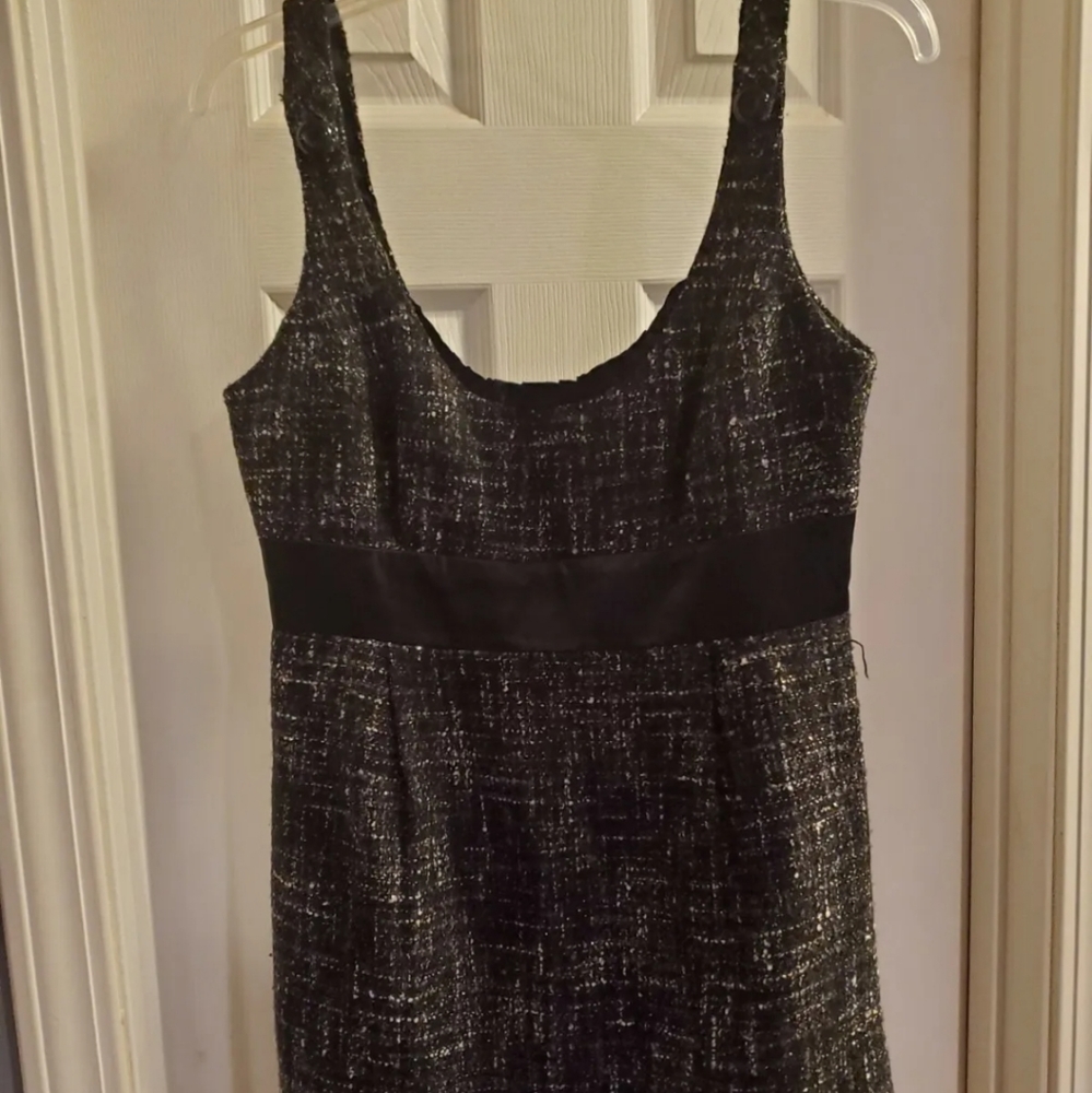 Guess juniors size 9, black tweed jumper. Black satin ruffle at front neckline.